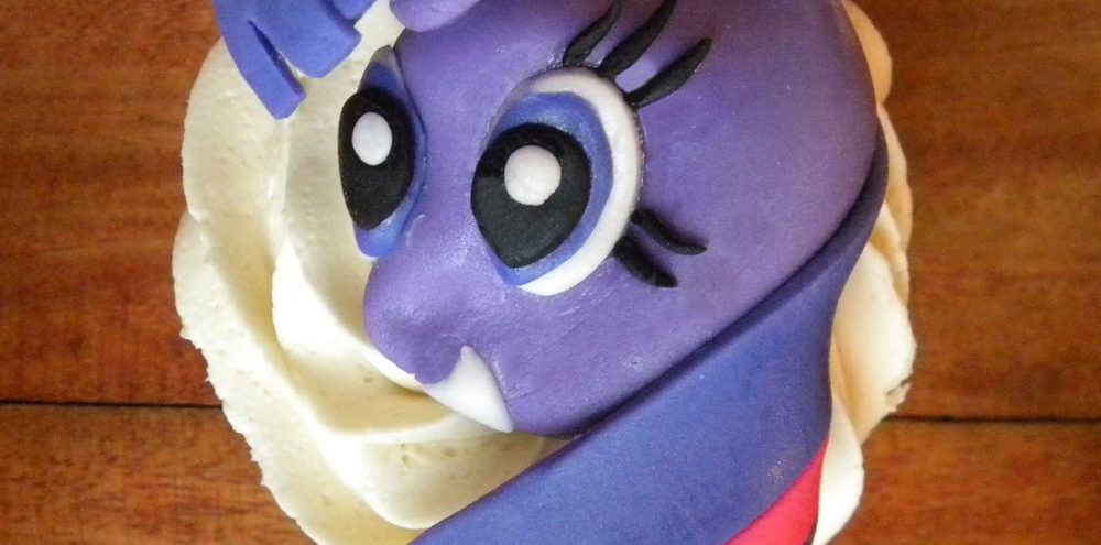 Close up of cupcake with Twilight Sparkle decoration