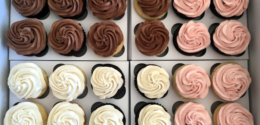 Neapolitan cupcakes in three colours